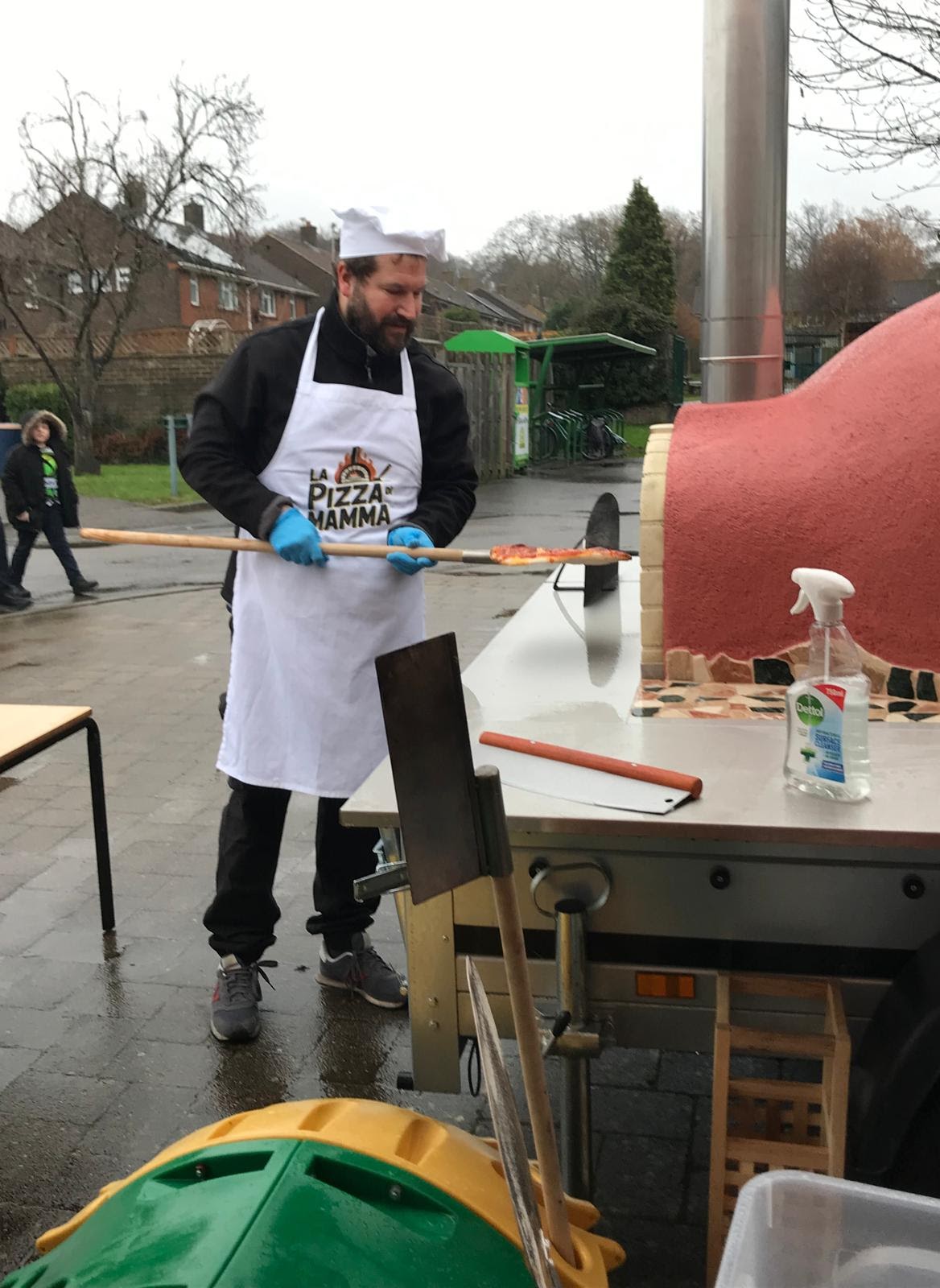 Kids making their own pizzas