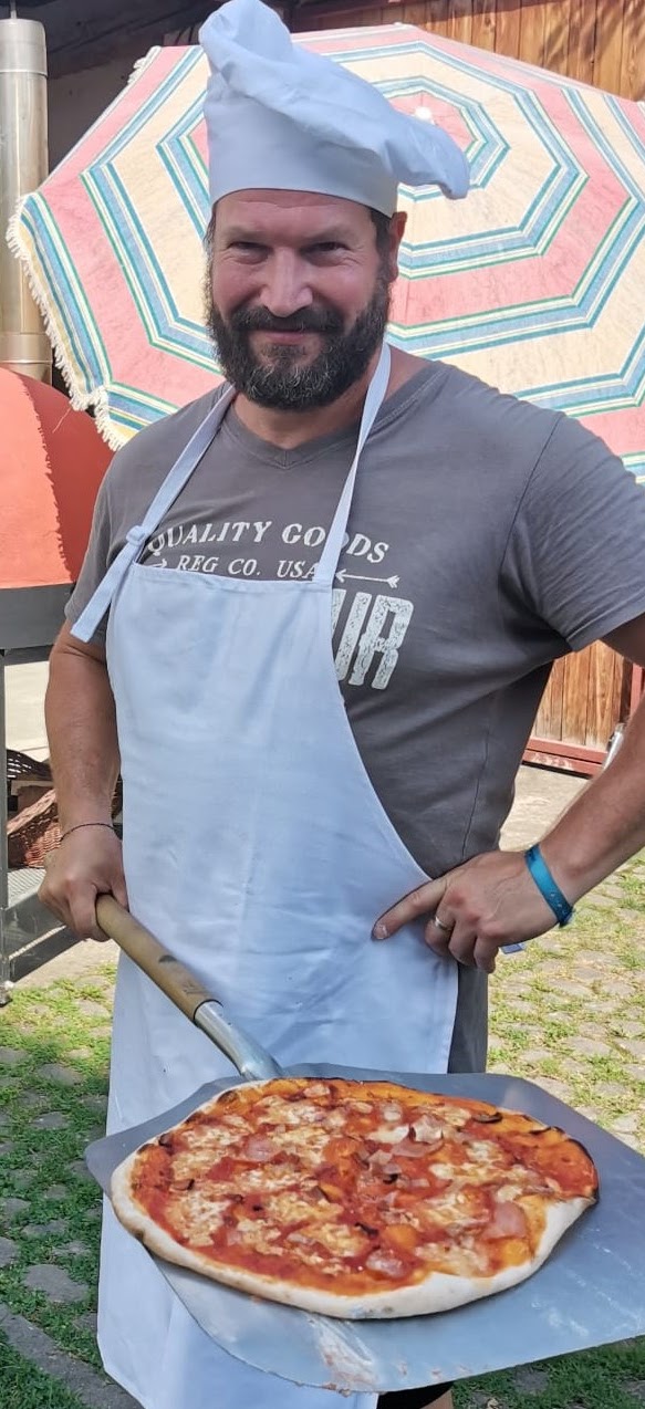 Pizza on peel ready for oven